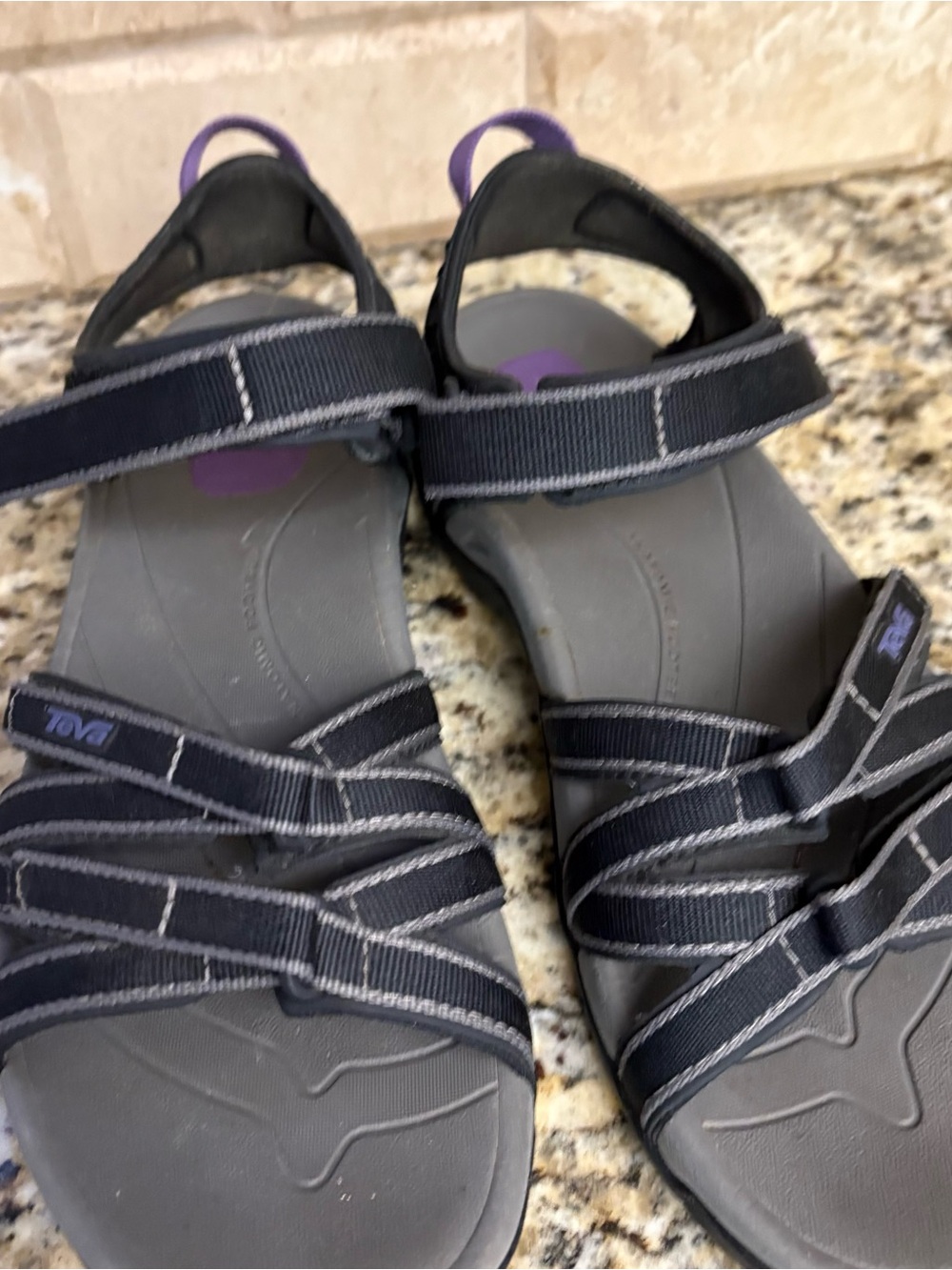 Teva Black Strappy Kids Sandals with Purple Heel Accent